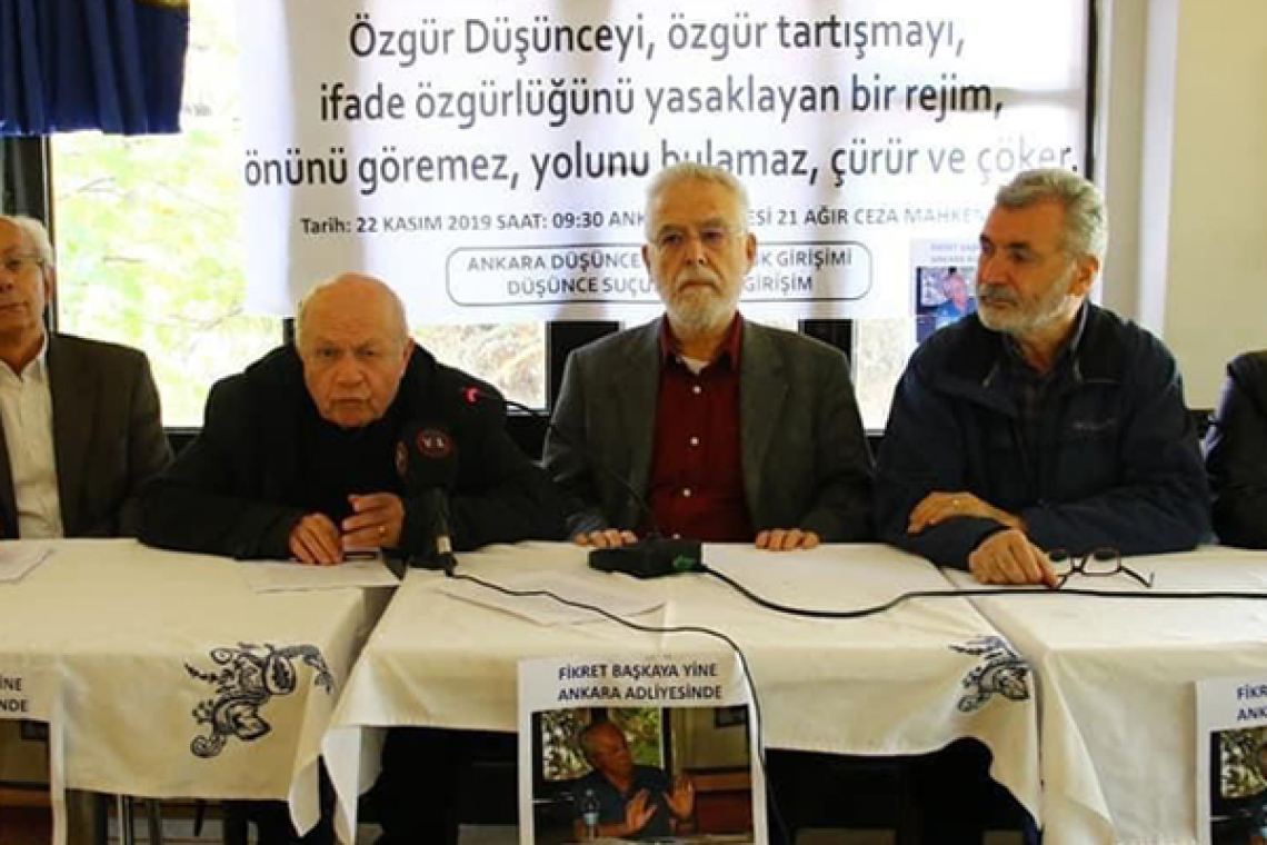 Politician faces 'propaganda' charges tied to photo of leaders from revolutionary left