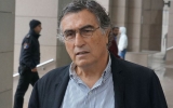 Journalist Hasan Cemal says he is on trial for defending peace in Erdoğan insult case